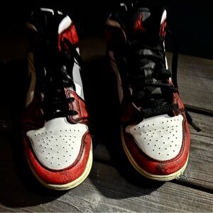 Red and black Jordan 1 trainers youth 7 shoes are in good condition